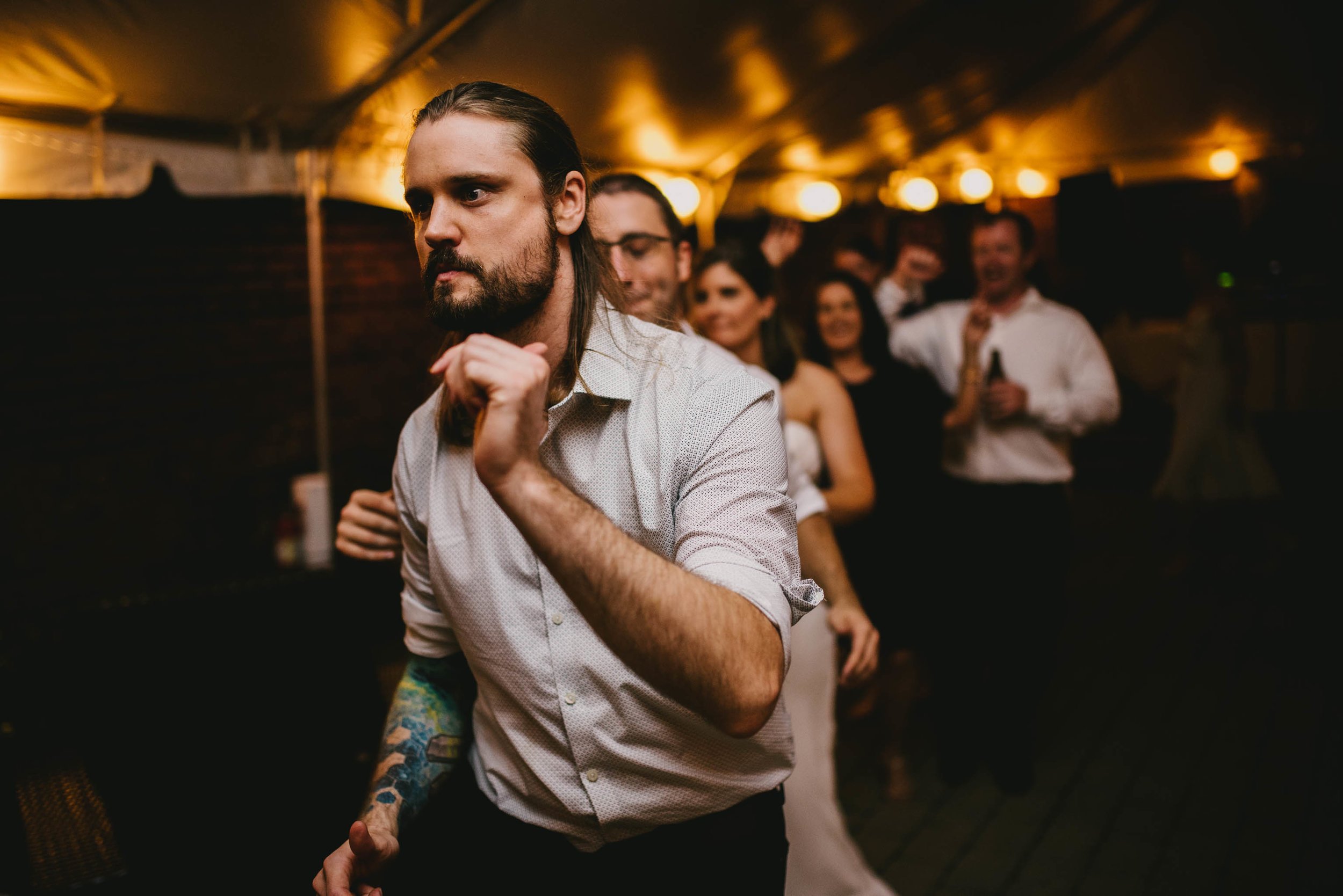 guests start dance train during this Jiddi Space and Courtyard Wedding at Sitti Restaurant