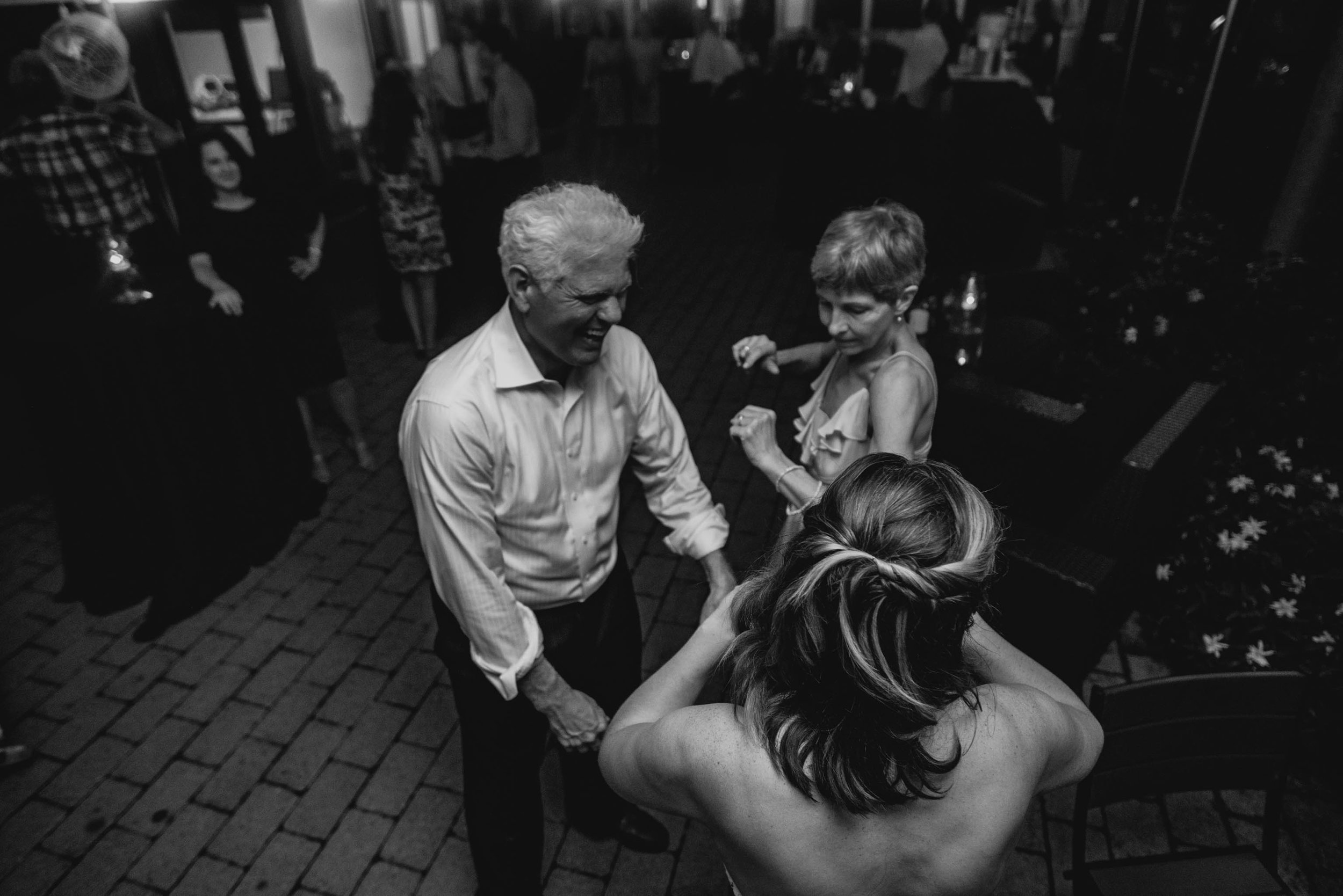 brides parent dancing with bride during reception at Jiddi Space and Courtyard Wedding at Sitti Restaurant