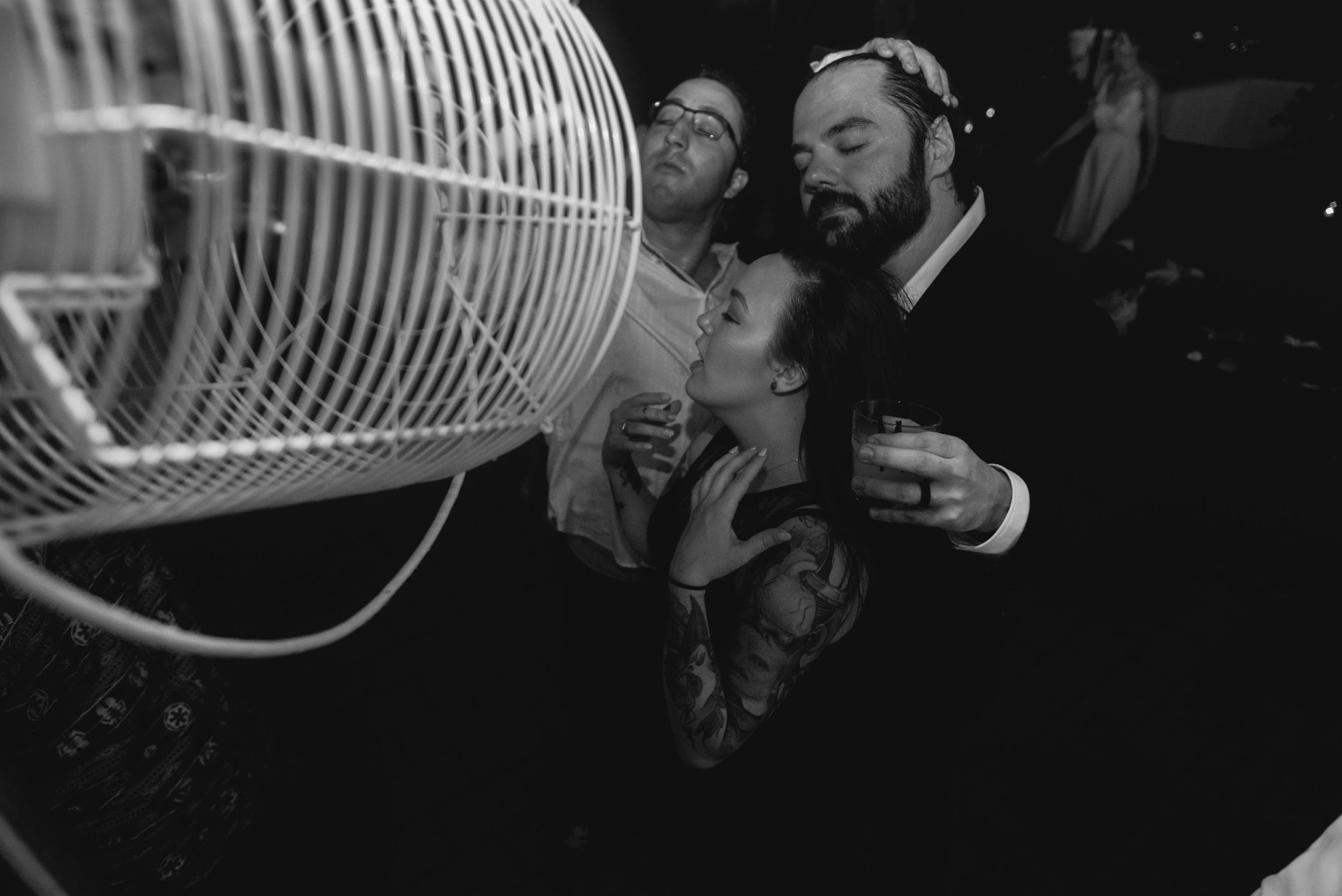 groom and guests trying to cool off during this Jiddi Space and Courtyard Wedding at Sitti Restaurant