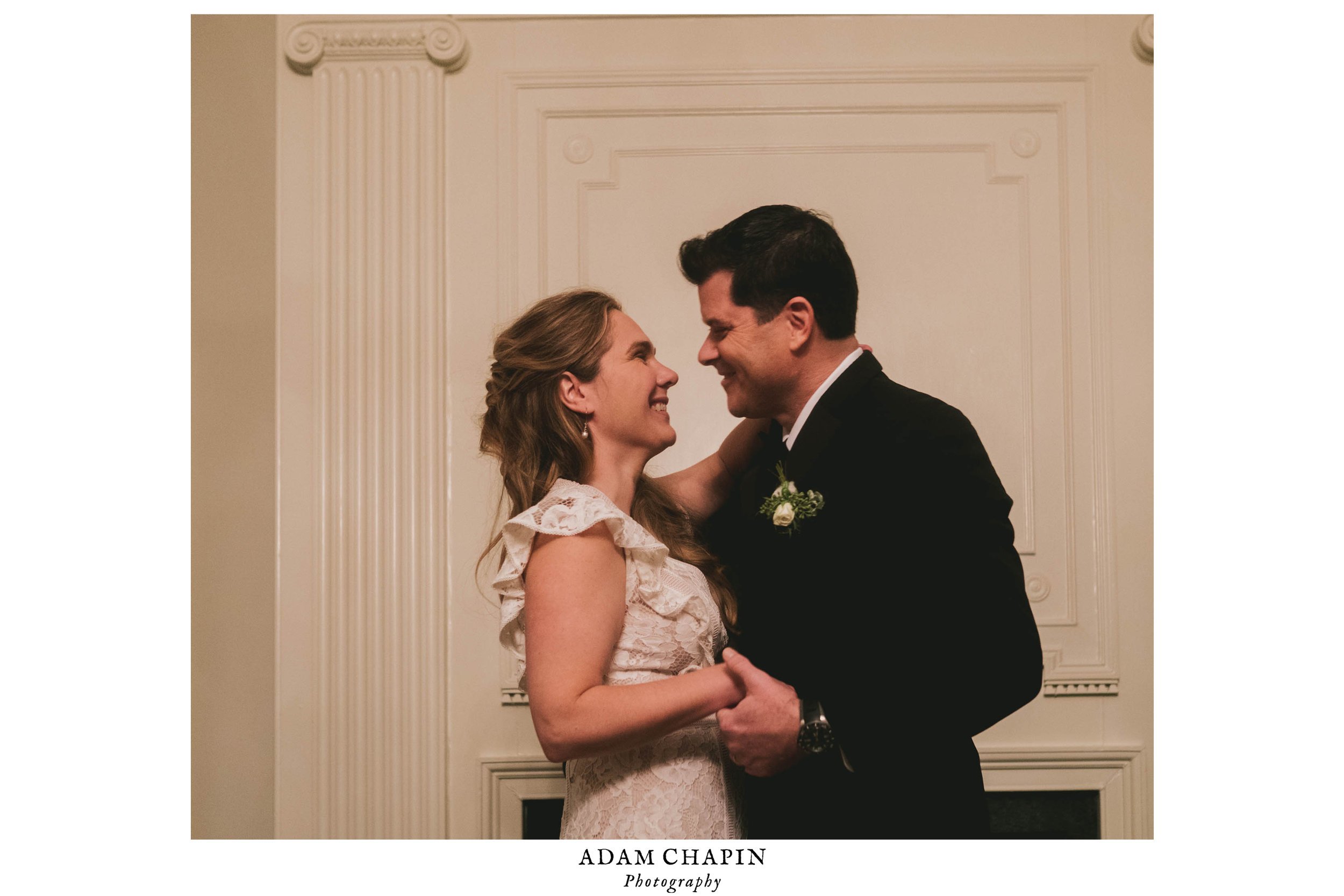 the bride and groom just after their first kiss as husband and wife