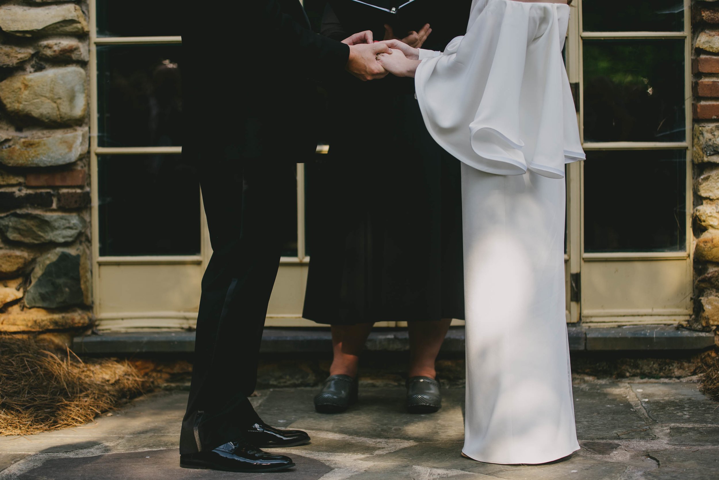 houghton-bride-and-her-groom-photo-exchanging-rings.jpg