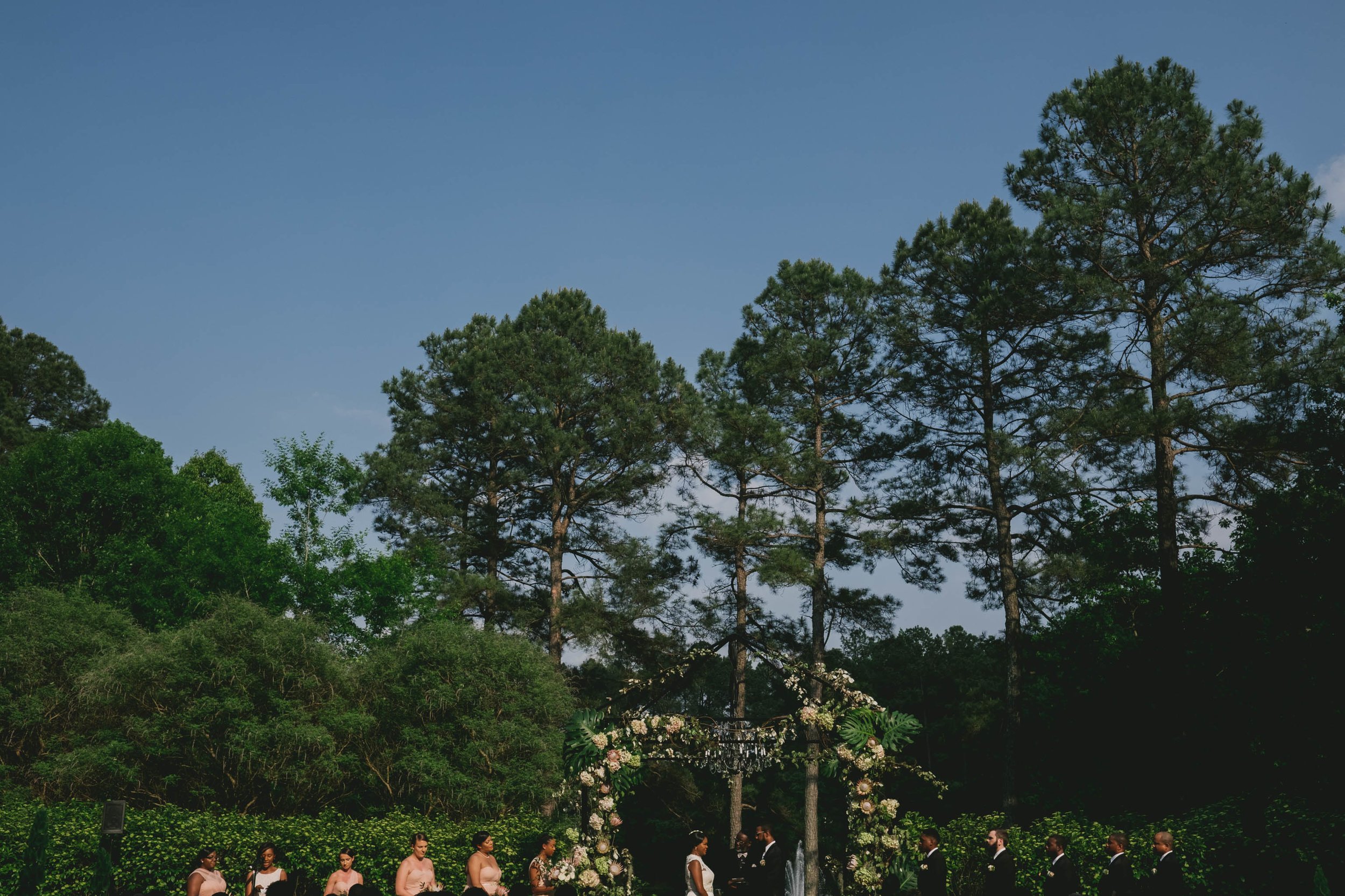 The wedding party preparing for the recessional at this Umstead Hotel wedding