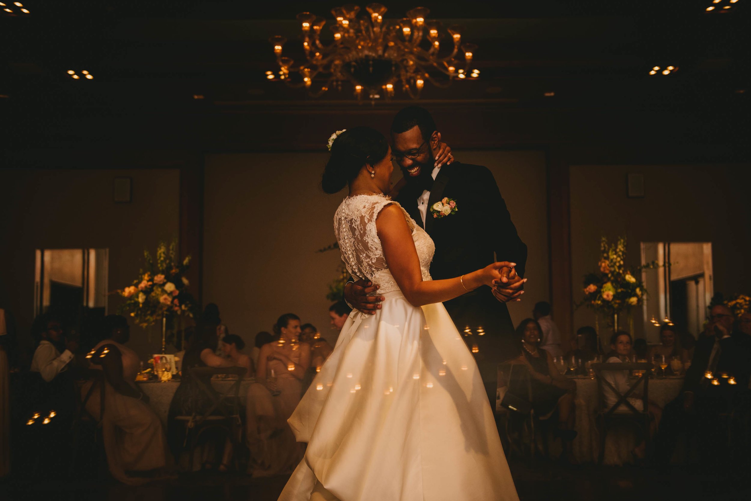 The bride and groom enjoying their first dance during their reception at the Umstead Hotel in Cary, NC
