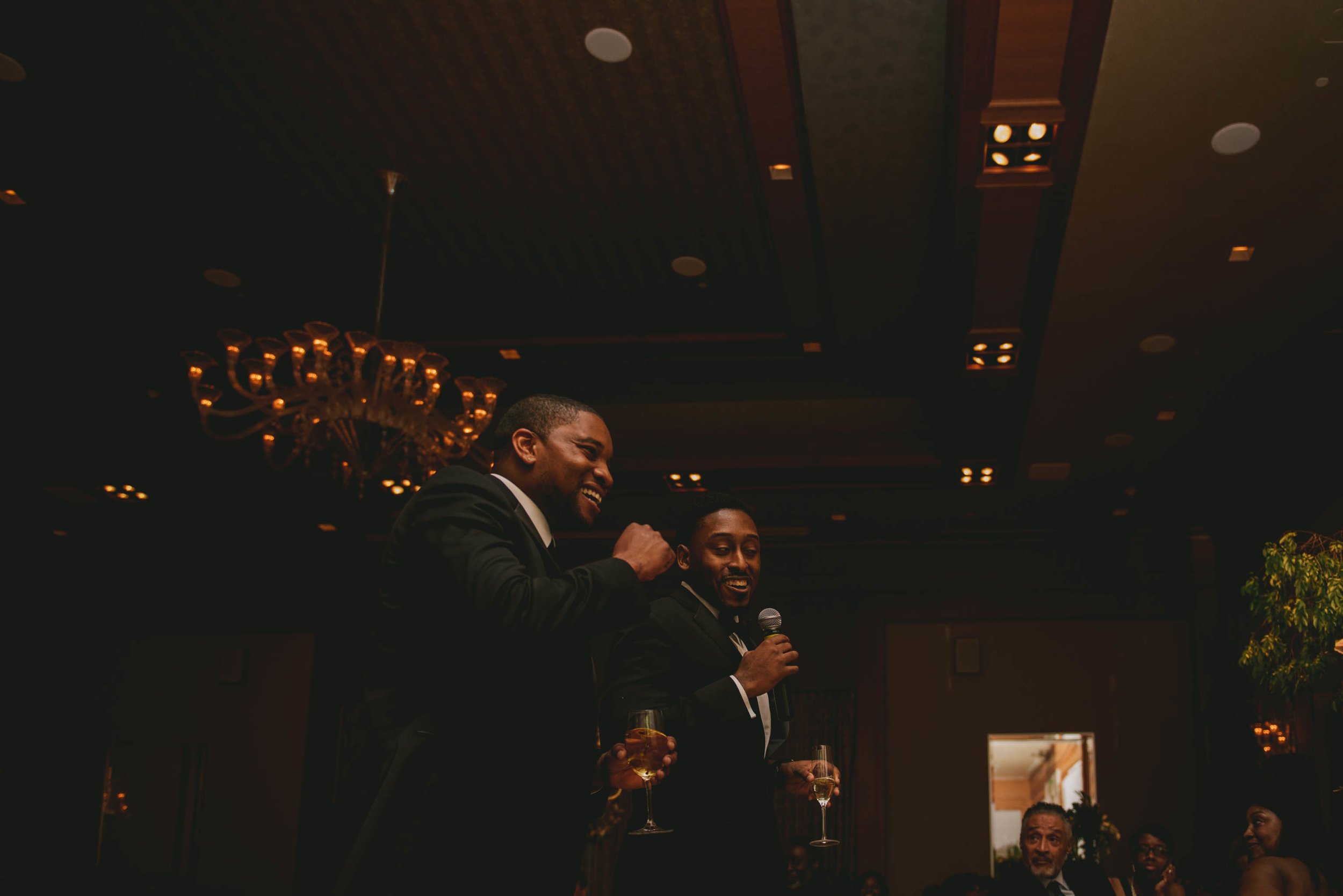 The best men sharing some wise words and a toast at this Raleigh wedding
