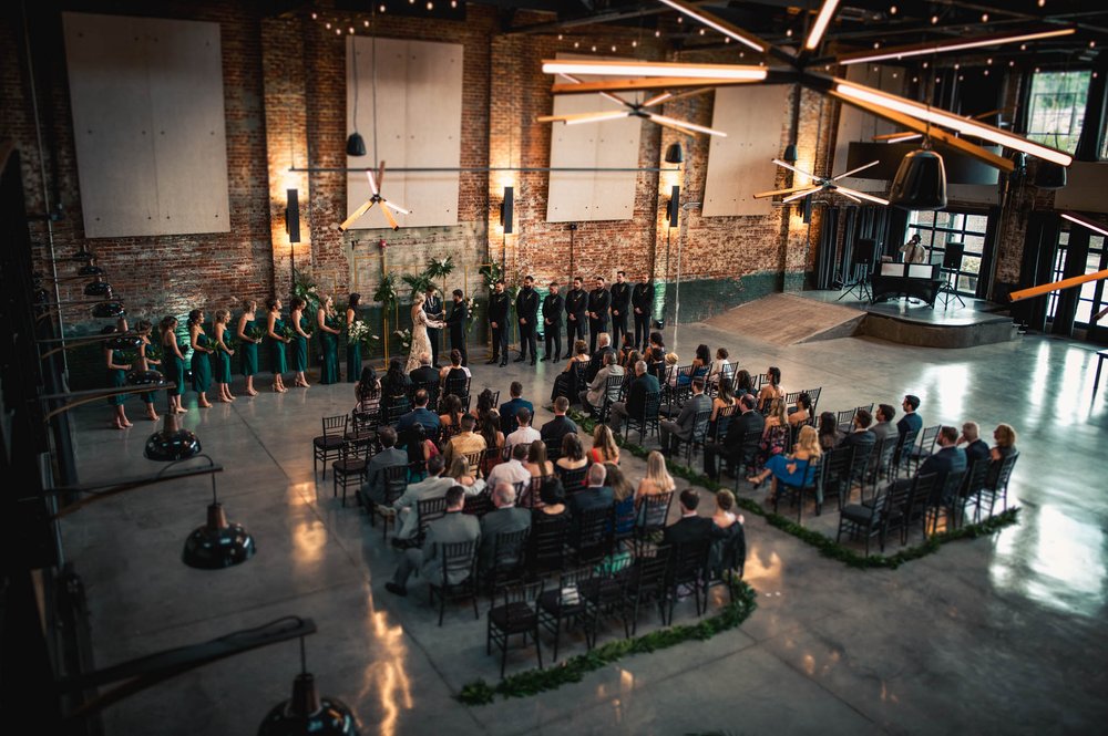 wedding ceremony in Cadillac Service Garage