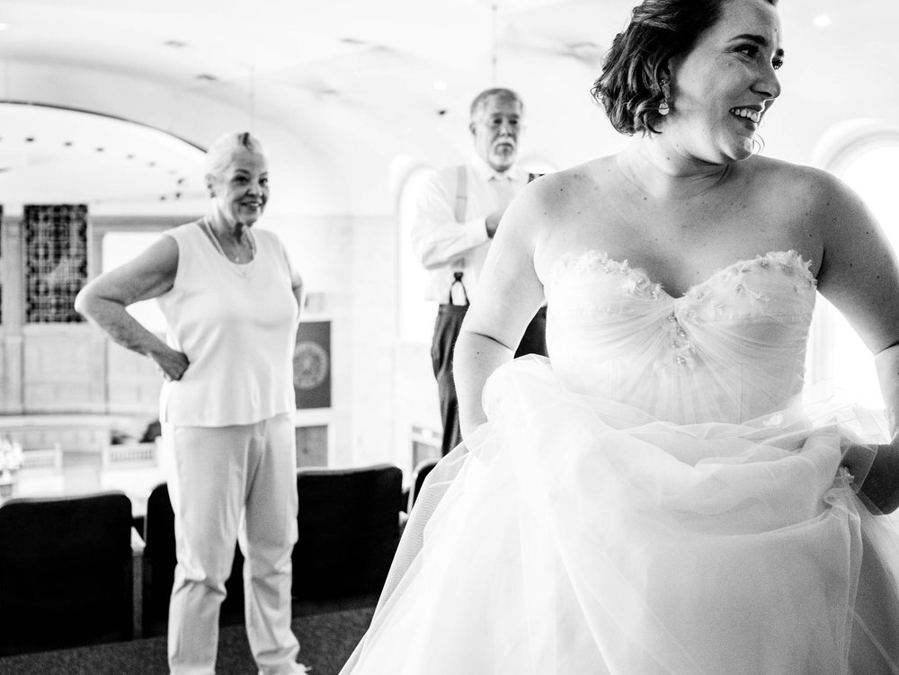 brides parents watching as the bride comes out and is ready for the ceremony