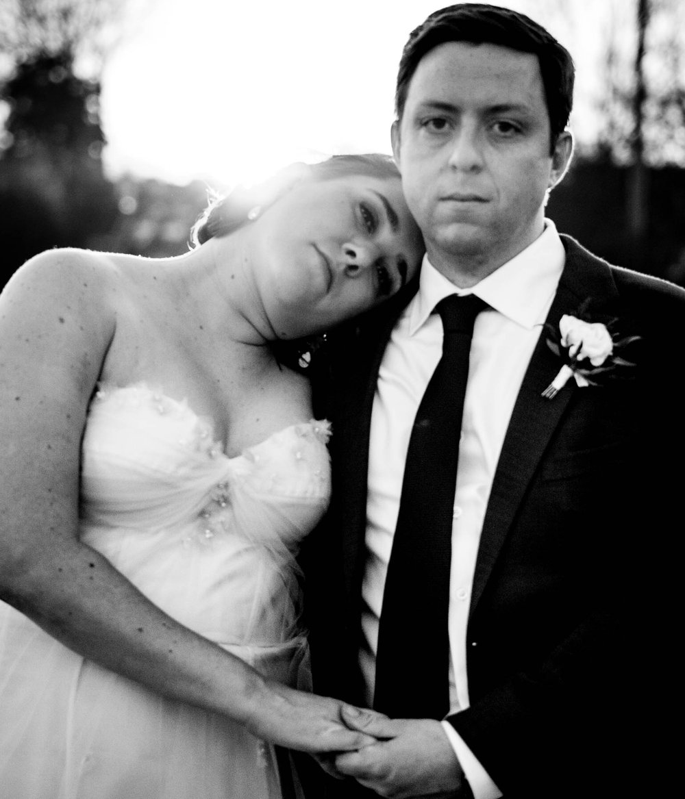 bride and groom looking stoic and in love 