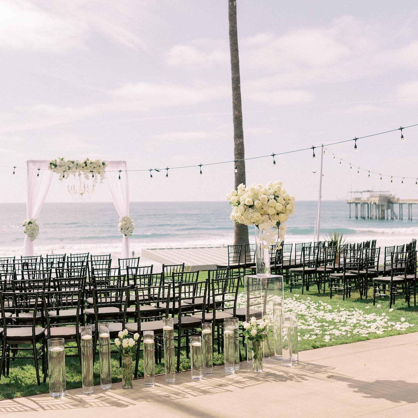 Still living through this beautiful beach front wedding 🌊✨

Wedding Planning &amp; Design @taylordeckerevents 
Venue #scrippsseasideforum 
Catering @wildthymeco 
Bartending @giuseppernfc 
Photography @christineskariphotography 
Videography @shoreand
