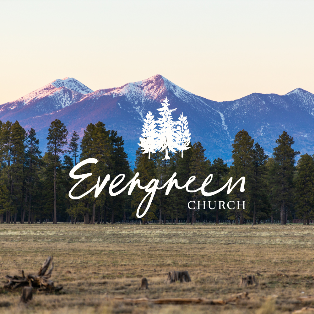 The logo for Evergreen Church features a background of a mountainous landscape with snow-capped peaks, a dense forest of pine trees, and an open field in the foreground.