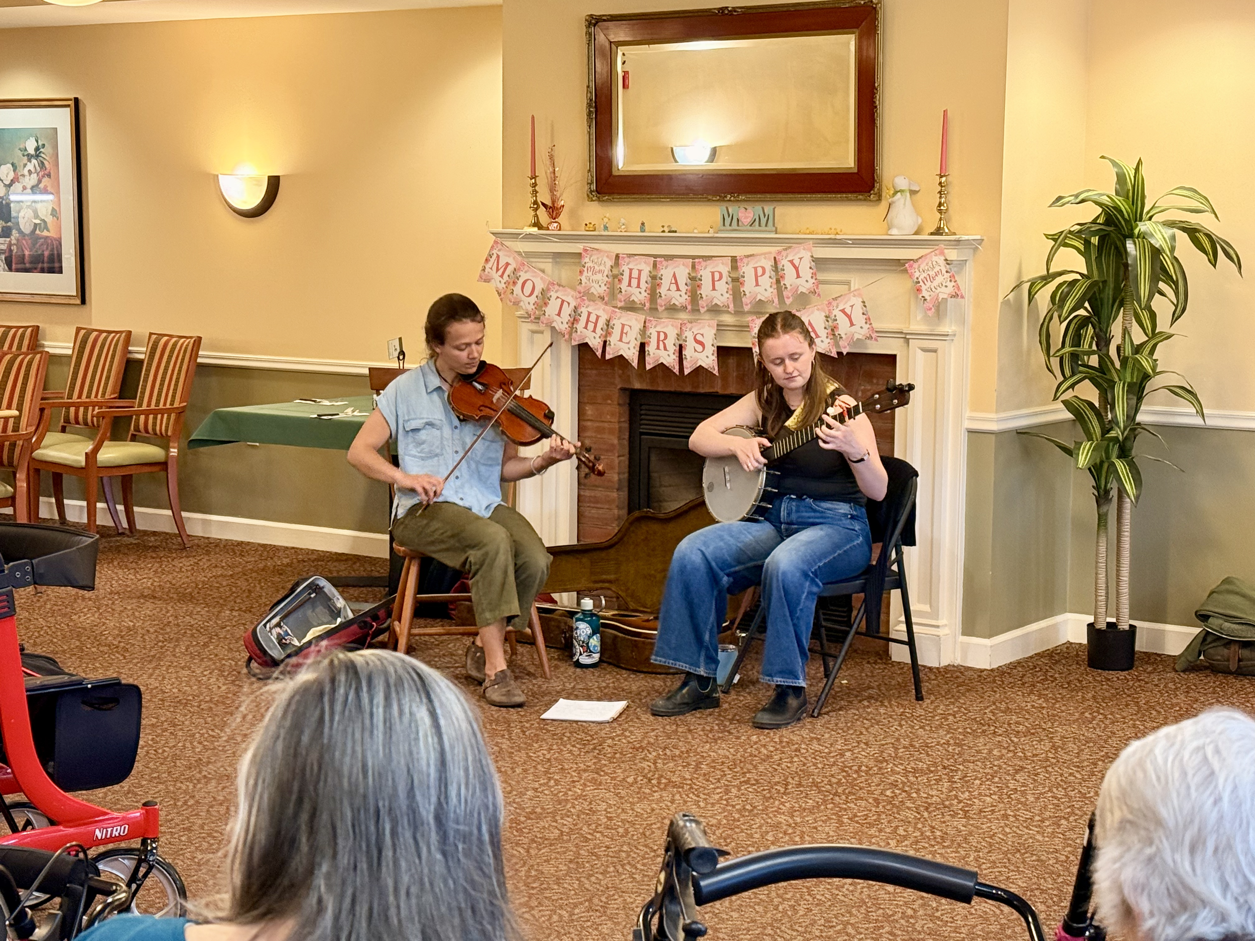Eliza Goodell and Nora Brown perform at the Converse Home