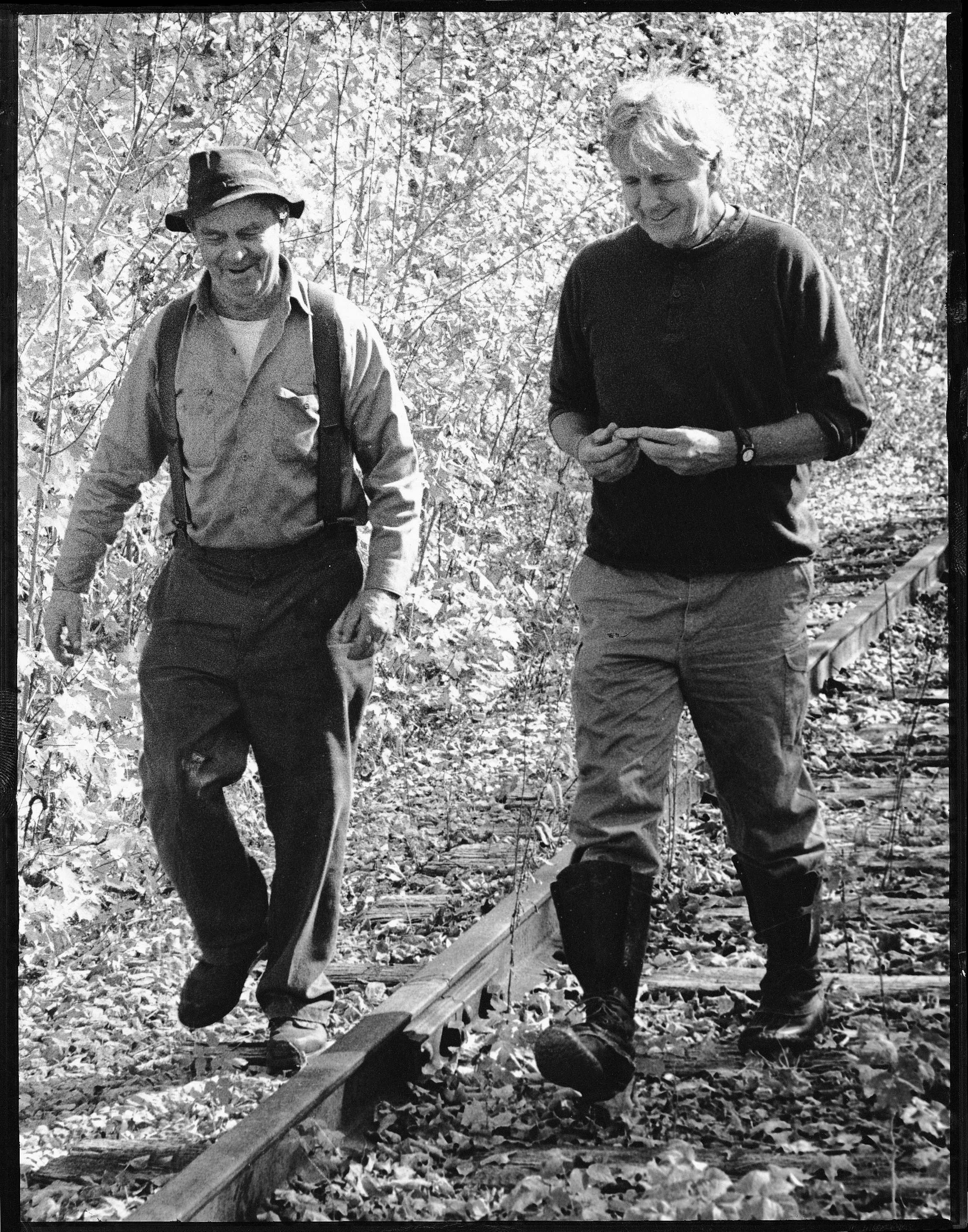 Ethan (right) walking with Frank Foster along the St. Johnsbury and Lamoille County railroad train trestle. Photo by Melissa Fisher, 1998