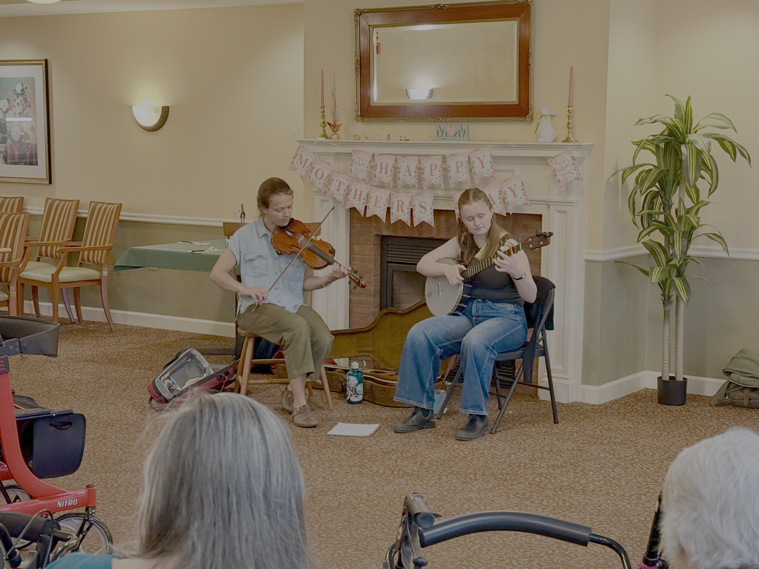 Eliza Goodell and Nora Brown perform at the Converse Home