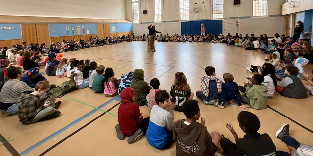 Aline Mukiza sharing Burundian dance steps at Edmunds Elementary School
