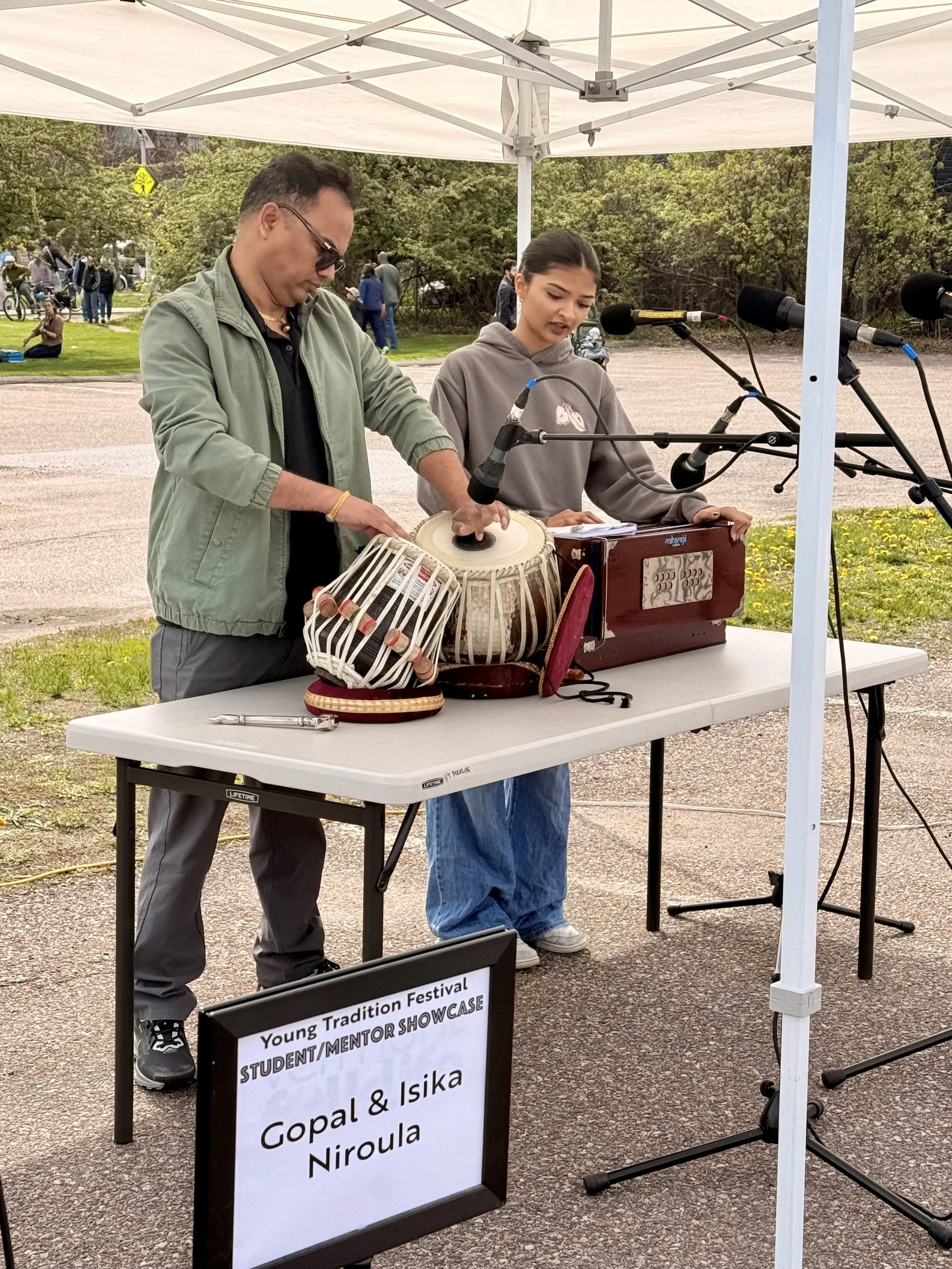 Gopal and Isika Niroula playing tabla and harmonium