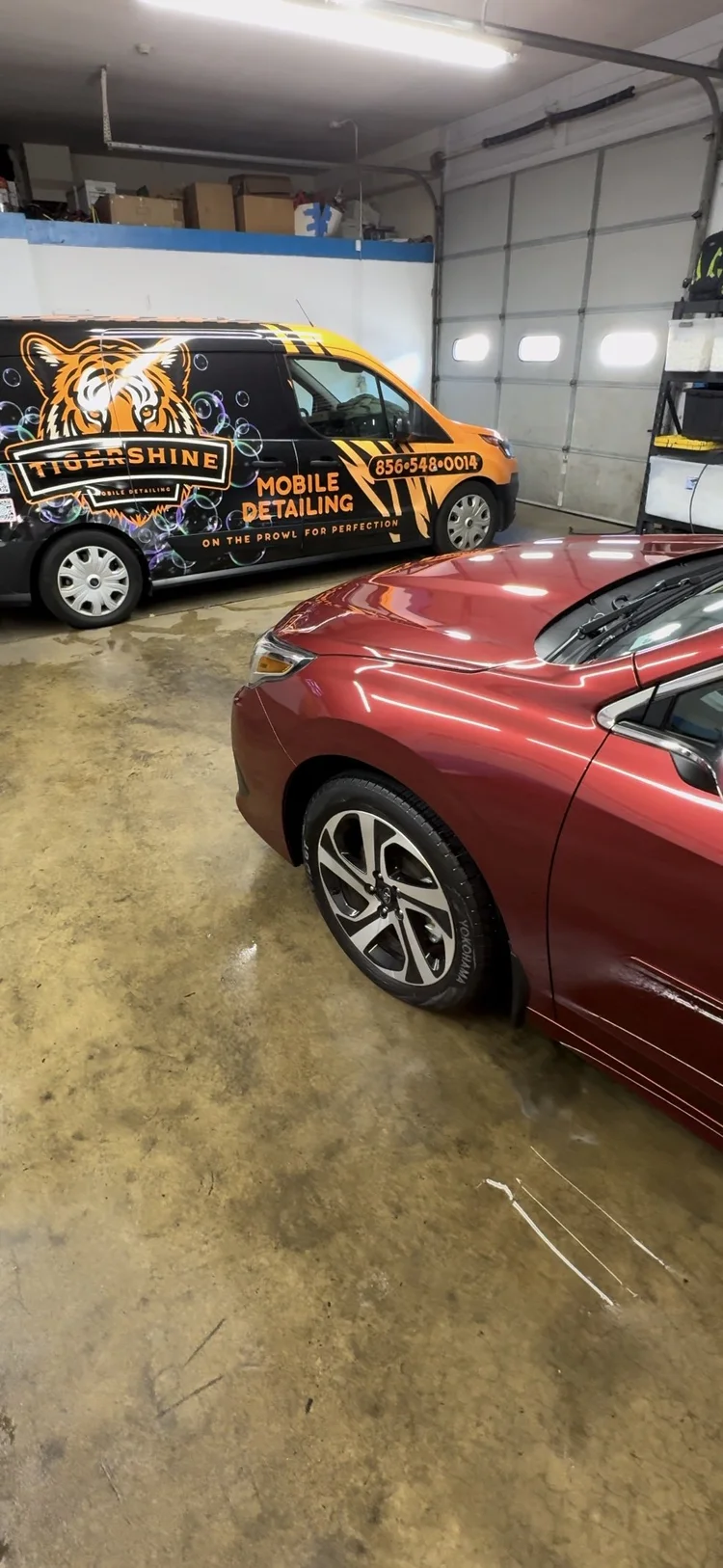 Dark red sedan with a mirror-like finish