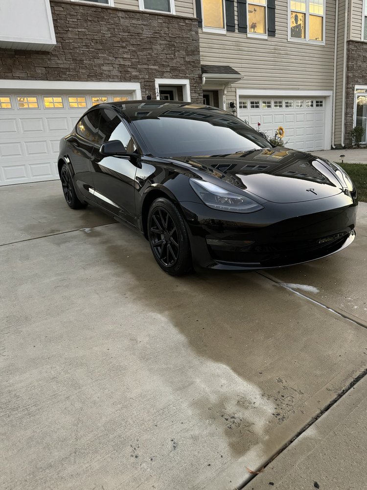 Black Tesla with a deep gloss finish