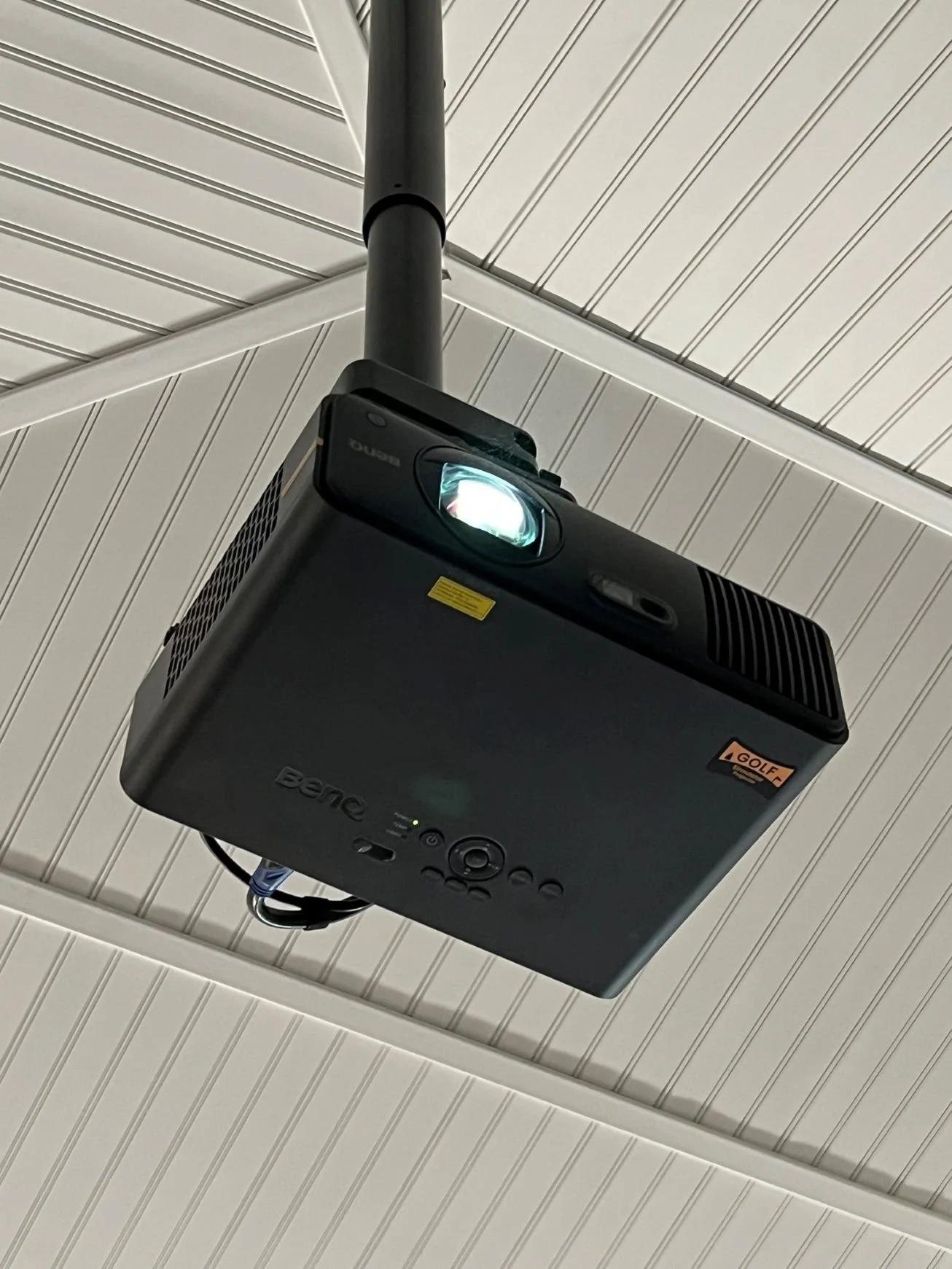  The BenQ AH700ST projector delivers crisp HD visuals with 4000 lumens of brightness, perfect for golf simulation, movie nights, and game day viewing in any lighting condition. 
