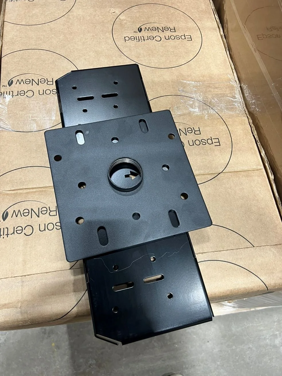 Black metal mounting brackets showing how to mount launch monitor with bracket assembly