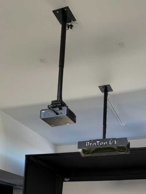 Ceiling with a mounted projector and a ProTee VX motion tracking system.