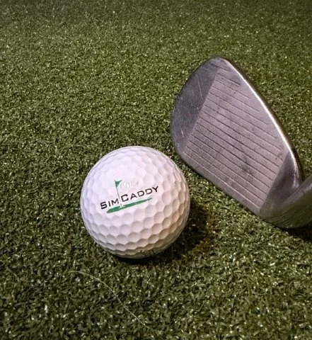 Indoor turf provides consistency and feedback, but the club–turf interaction is fundamentally different from real grass.