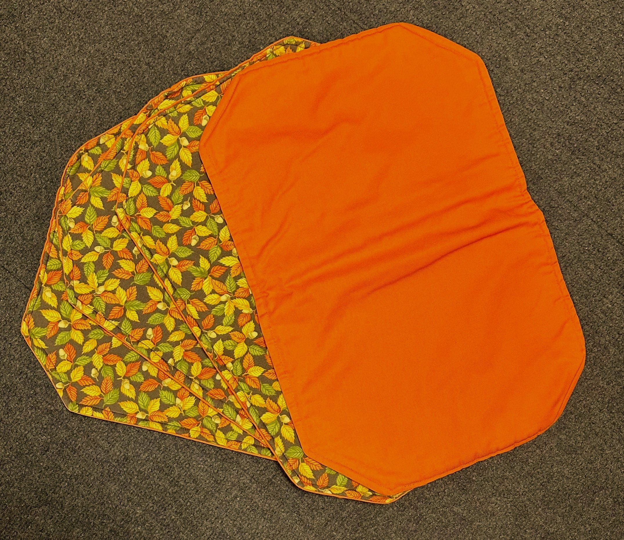 Four quilted placemats