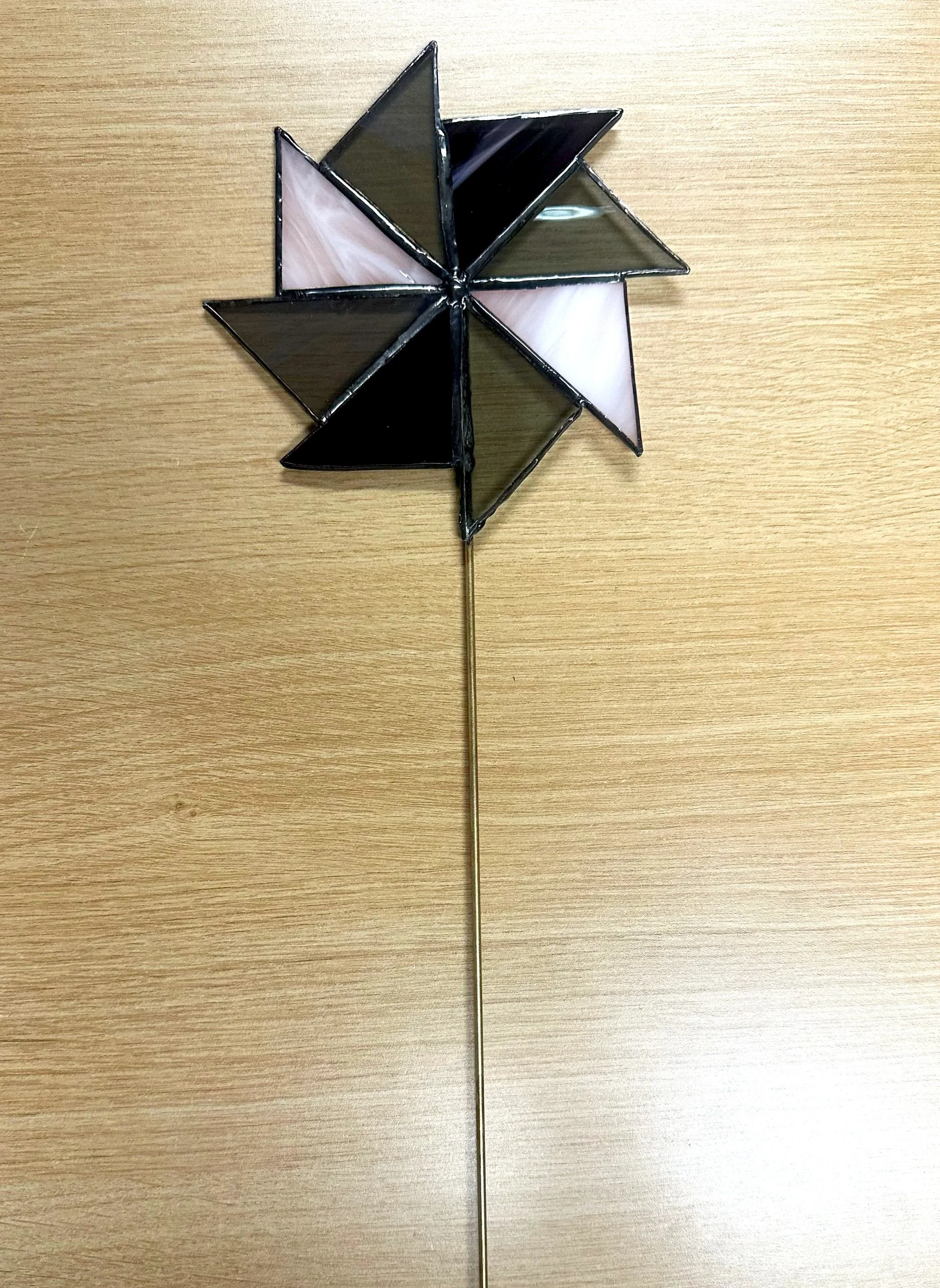 Grey stained glass plant ornament