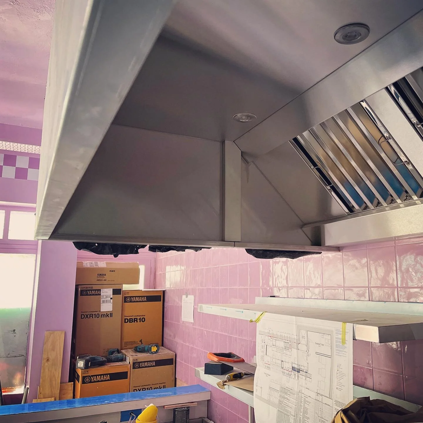 Soho Burger Restaurant Renovation. Open plan American diner interiors. #americandiner #purpletiles #restaurantrenovation #oldcomptonstreet #openingsoon