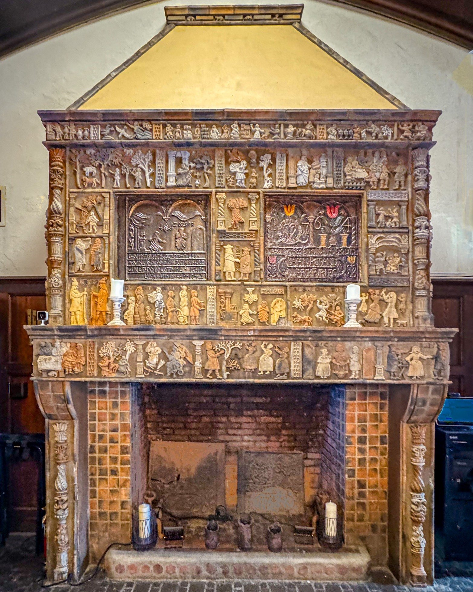 Our uniquely beautiful event venue was built in 1916 in the Tudor Revival Style.  The space is buttressed by two immense fireplaces with mantels covered in original Mercer tiles from the Moravian Pottery and Tile Works in Doylestown, Pennsylvania (on