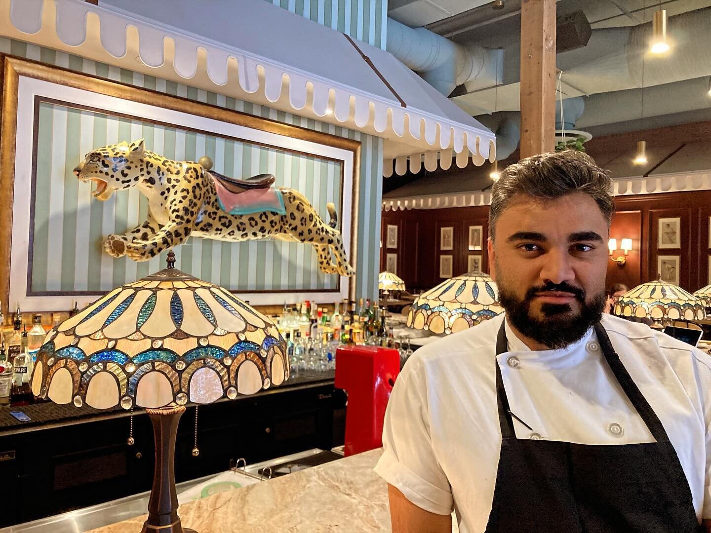 Meet chef Amit of the Calcutta Cricket Club. I popped in for lunch today to check out their new location. I was so happy to see the carousel leopard perched over top the bar. The colourful decor reminds me of my glorious travels in India back in the 