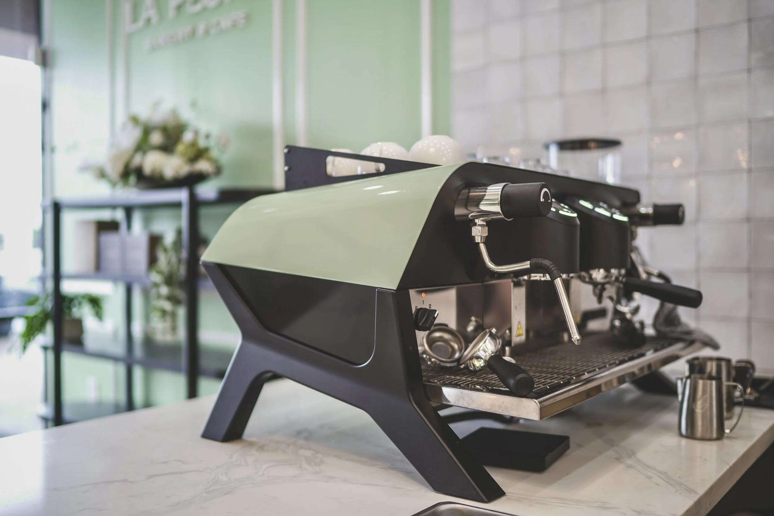 Modern bakery cafe green coffee machine