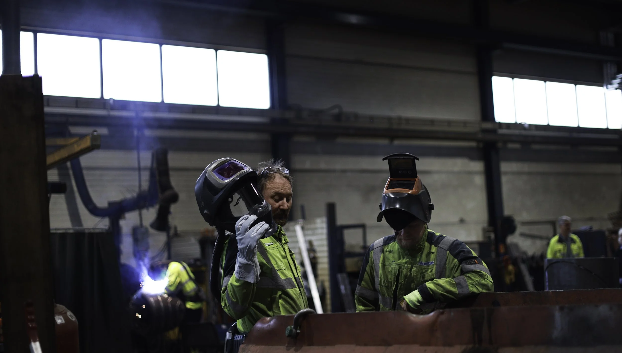 Workers at Acustus factory 