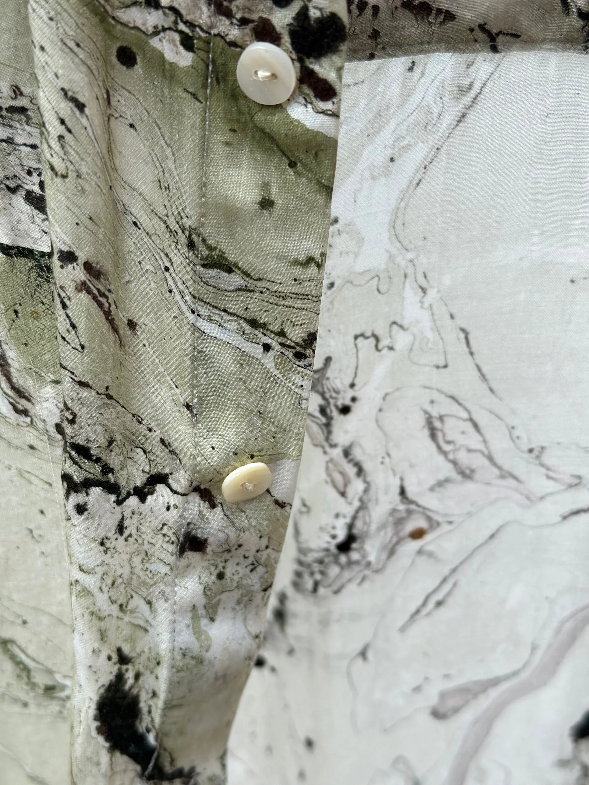 Modal silk-finish oversized shirt flat lay — eco friendly artisan French atelier