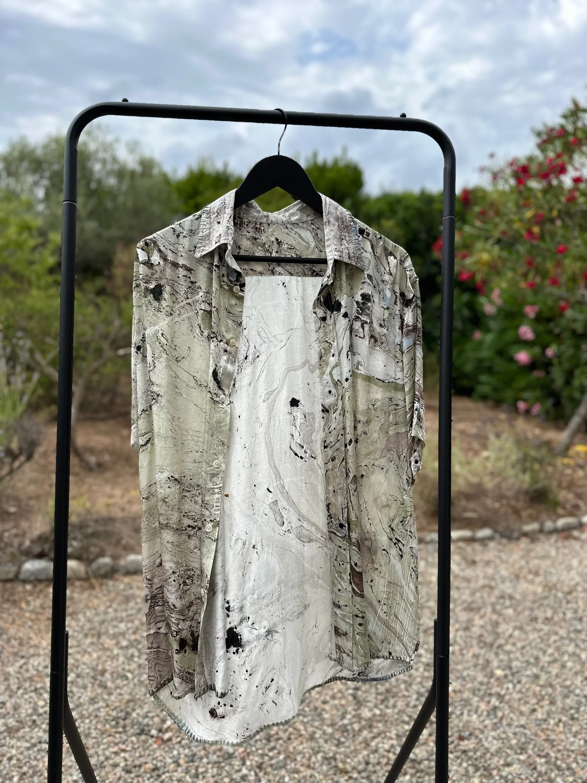 Front view of modal oversized shirt with silky drape and relaxed silhouette