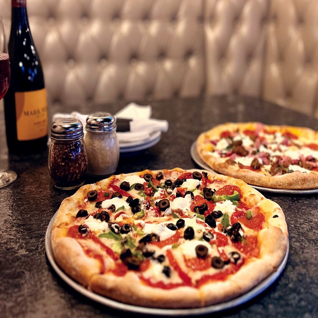 It's feeling like a pizza night, why not try something new? Serving up two specialty pizzas tonight: 

Mama Mia- 12&quot; Pizza, garlic cream base, shredded mozzarella, pepperoni, sausage, ham, ricotta. 

Amalfi-12&quot; Pizza, red sauce, shredded mo