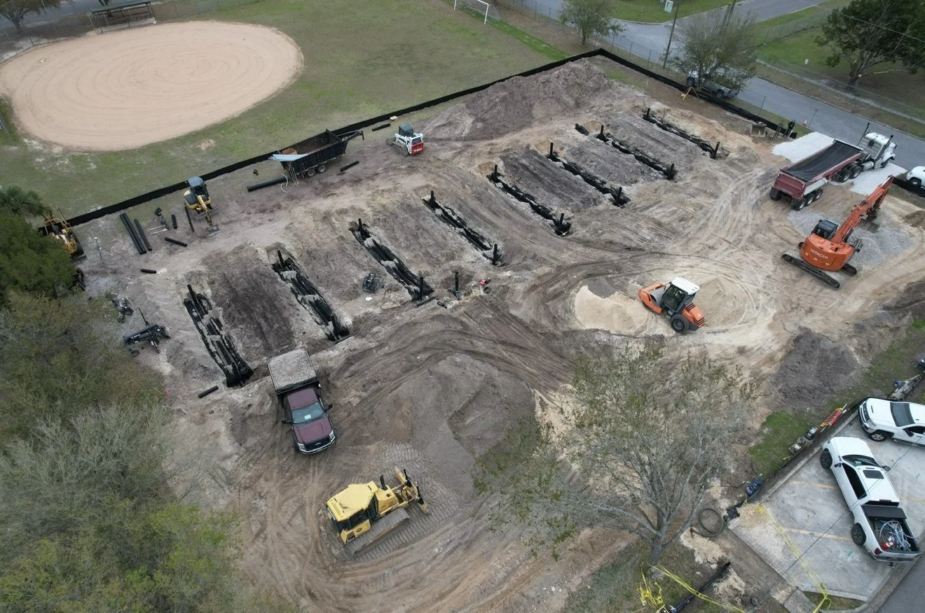 Aerial view of Knepp Construction site preparation project with drainage installation, dozers and excavators