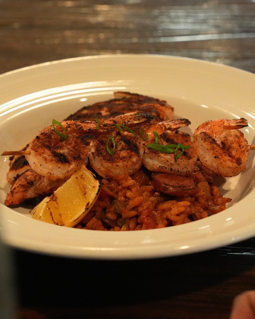 Come get a taste of the bayou with our Creole Chicken &amp; Shrimp! Juicy seasoned chicken thigh, flavorful andouille Sausage, succulent roasted shrimp, all nestled on a bed of arborio rice and drizzled with zesty creole sauce. Open at 4pm for Dinner