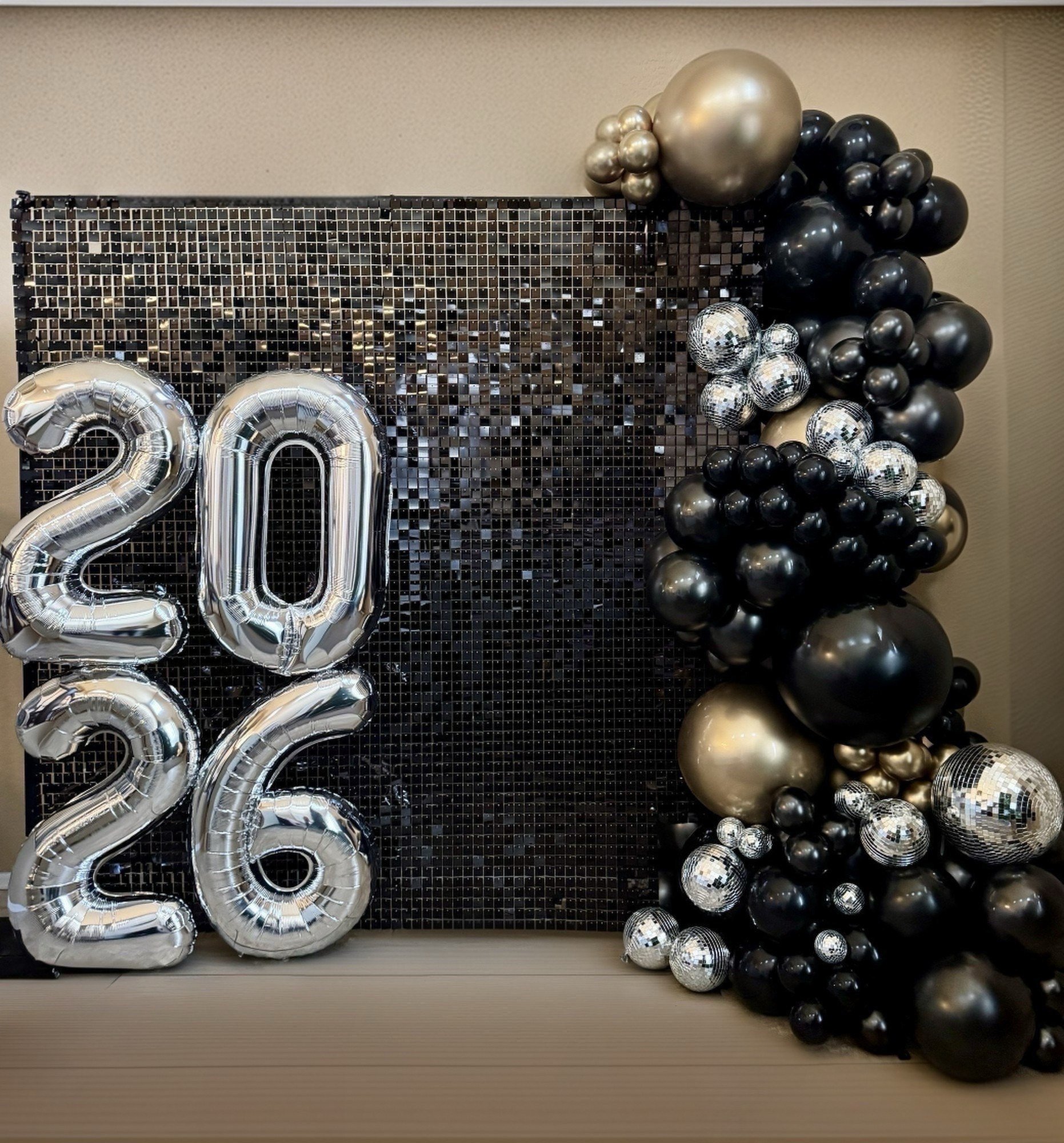 New  Year's Eve balloons black gold shimmer wall 