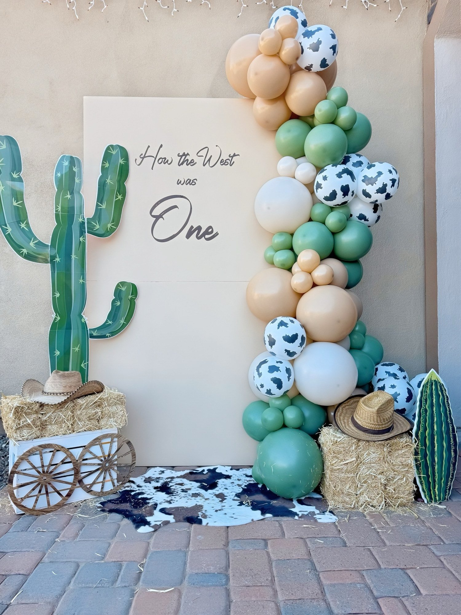 Western cowboy balloon garland how the west was one boy birthday 