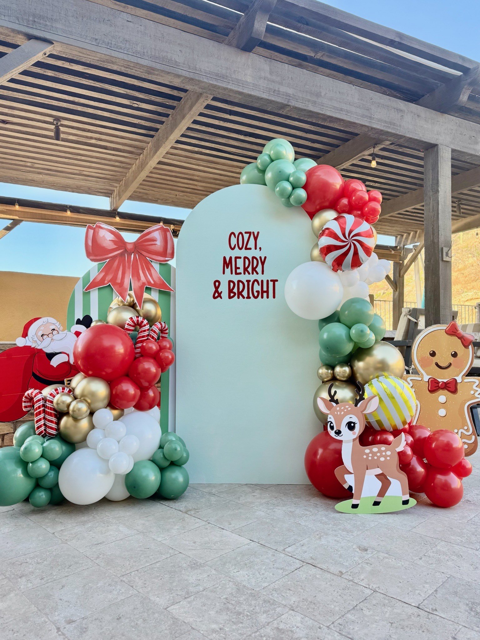 Christmas balloon backdrop Santa gingerbread reindeer red green gold white