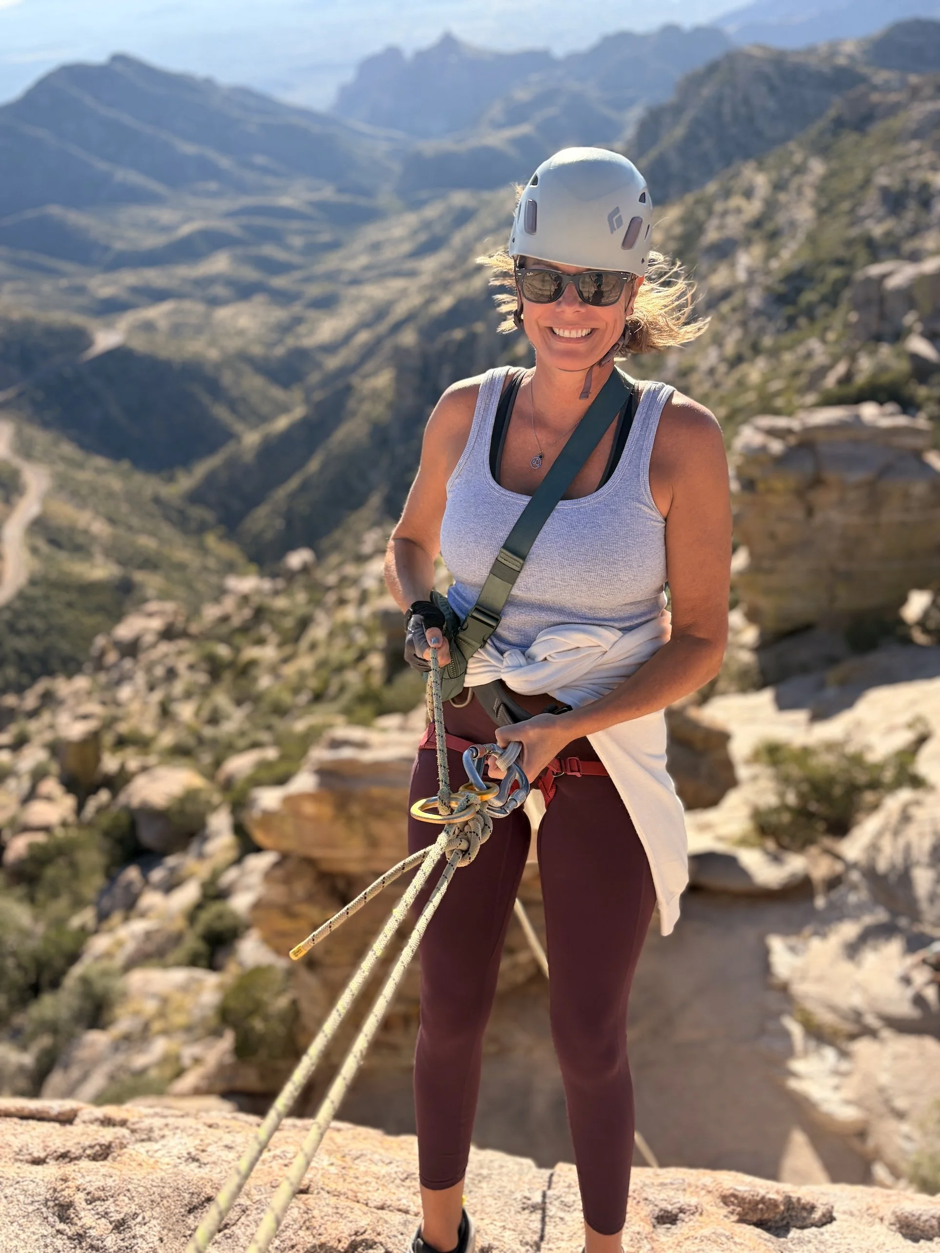 Guest with rappelling ropes after a guided Mount Lemmon rappelling trip