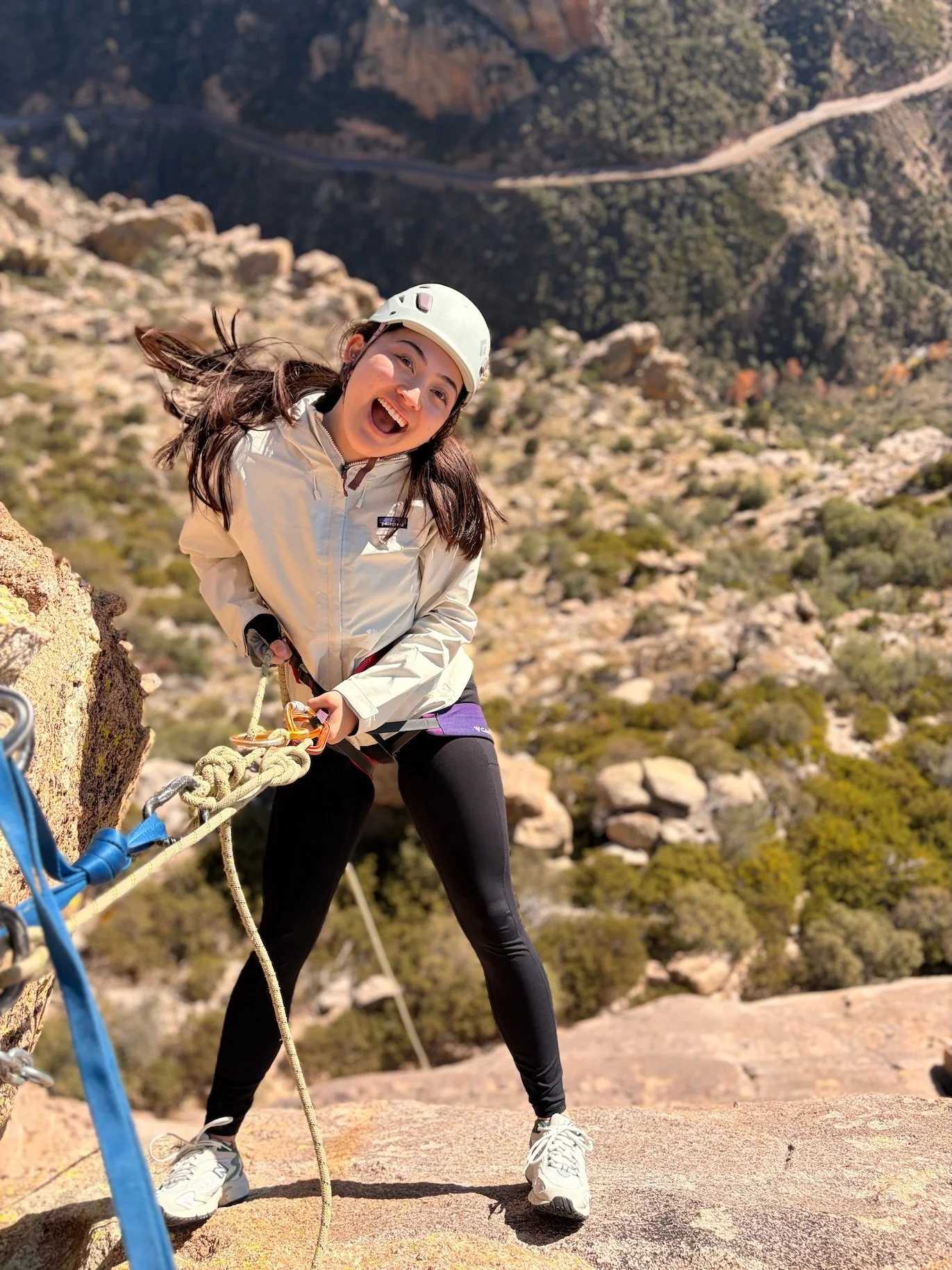First-time rappeller wearing a helmet and harness on Mount Lemmon
