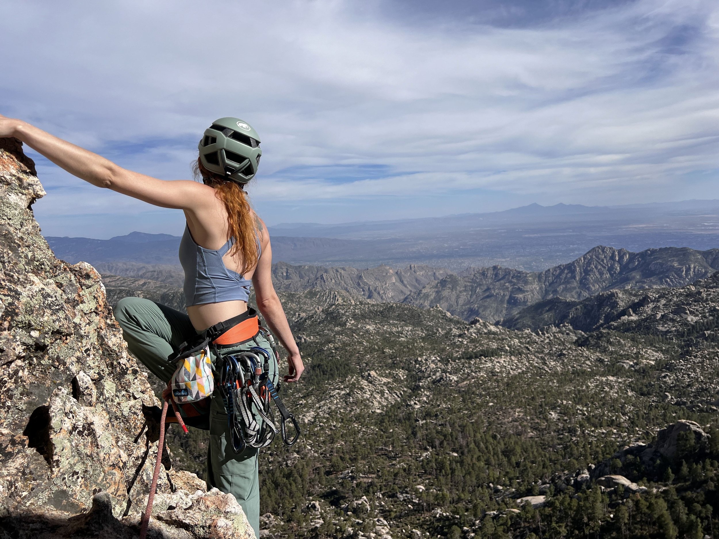 Climber overlooking the Santa Catalina Mountains from Mount Lemmon.