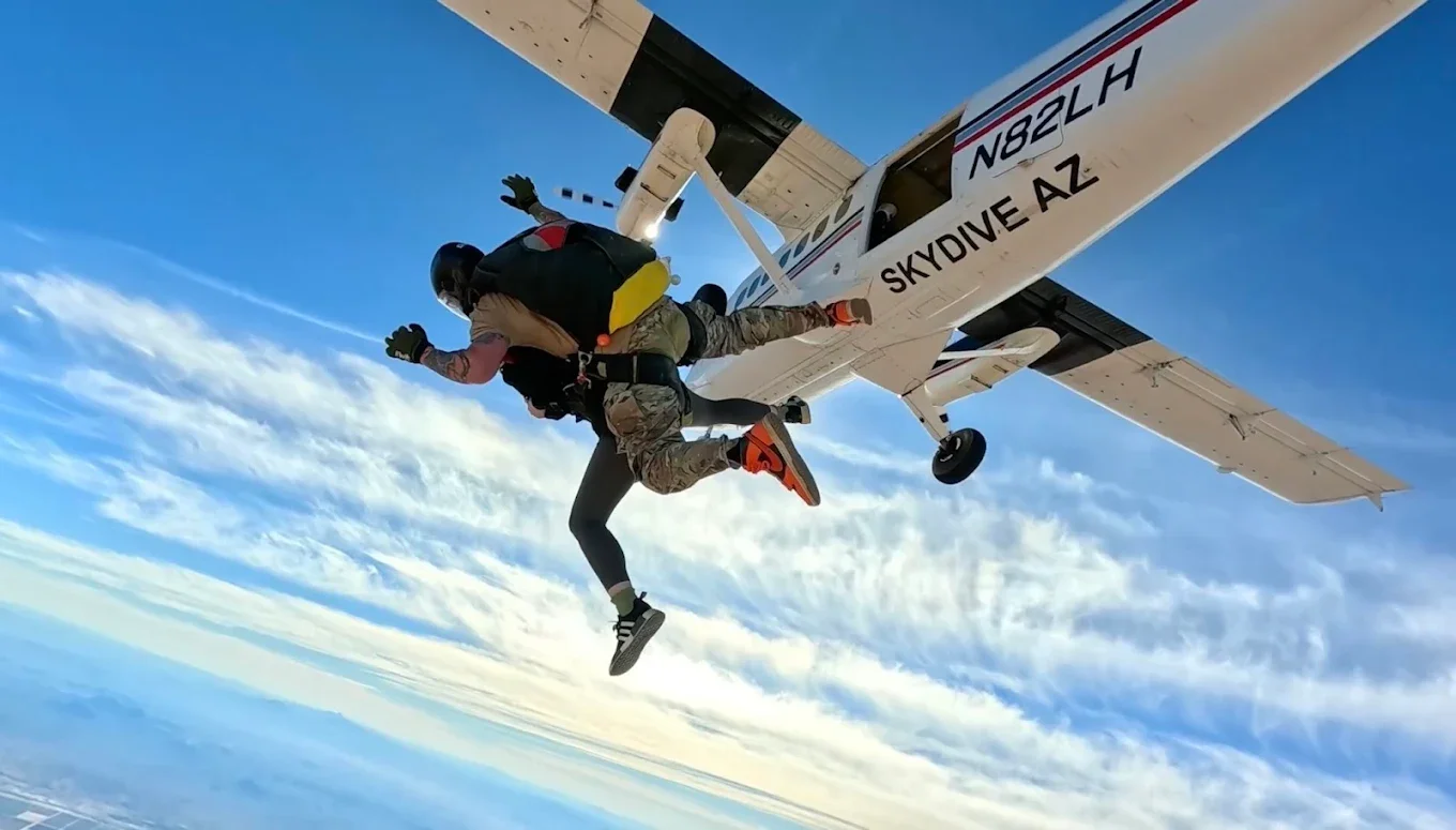 Skydiver above the Arizona desert during a tandem skydiving trip