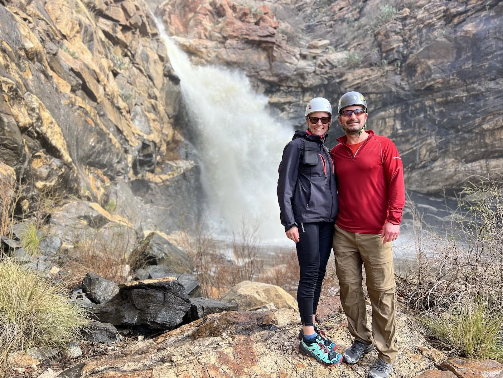 Canyoneering guests beside a waterfall in Southern Arizona.
