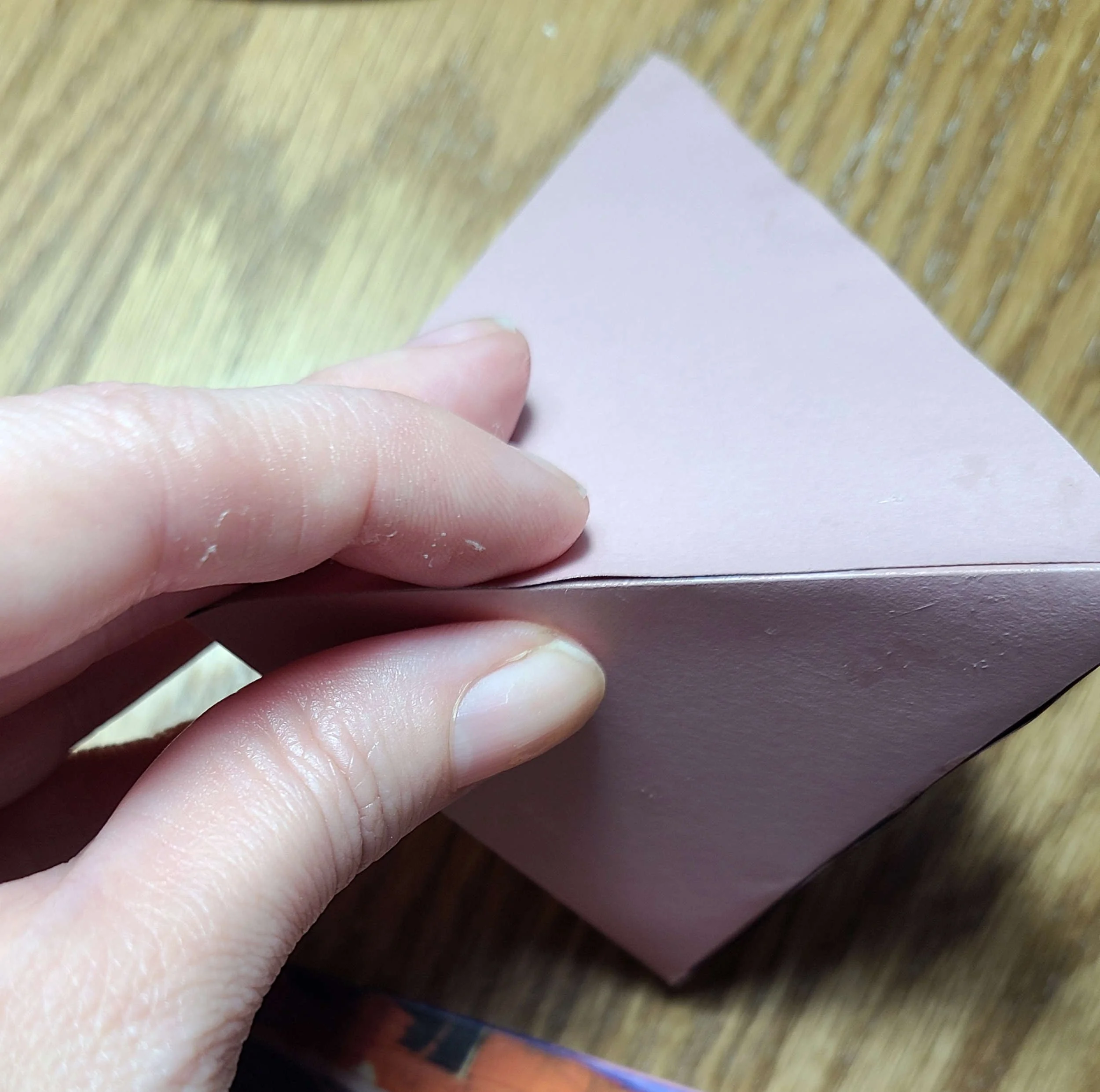Pinch to secure the glue