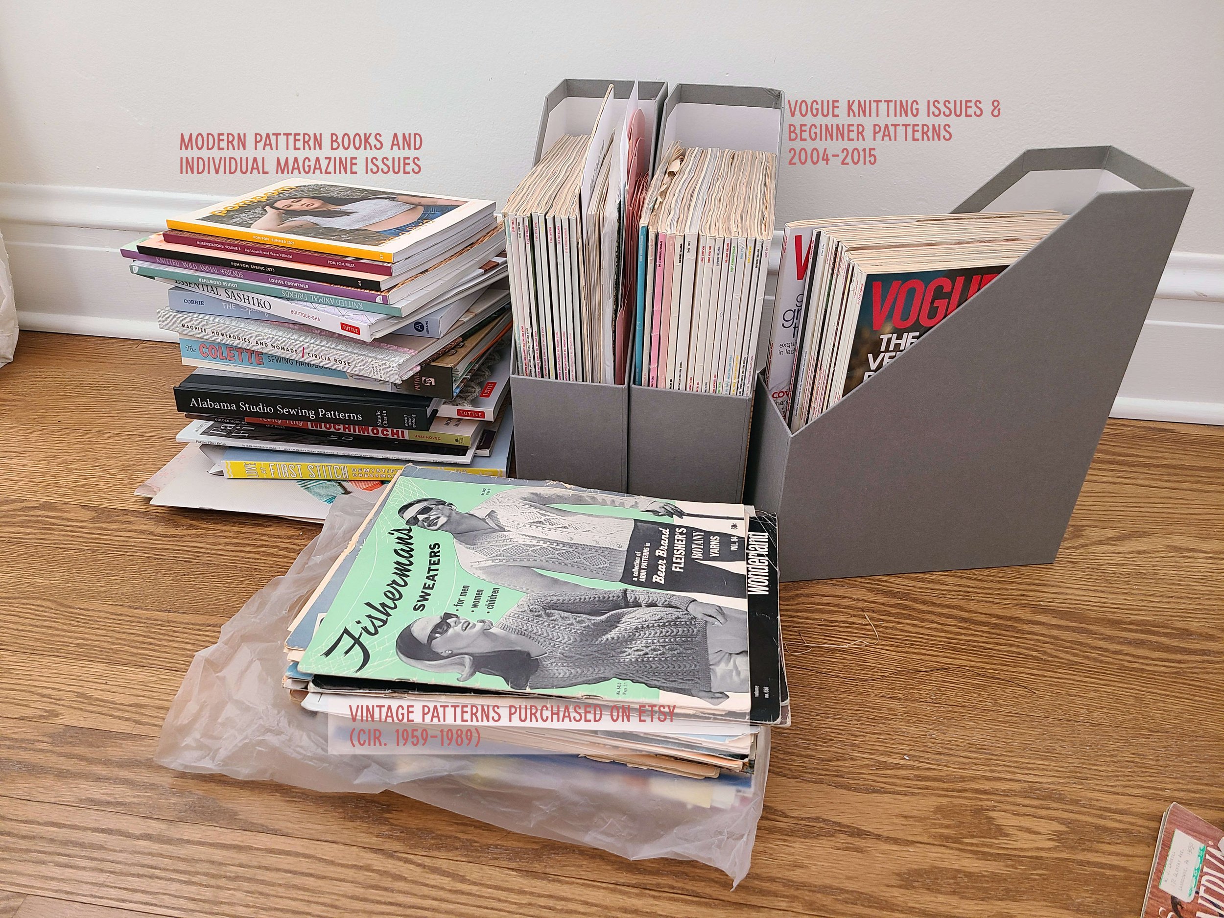 photo of several stacks of books and magazines sitting on a wood floor with the labels "modern pattern books," "vogue knitting issues 2004-2015" and "vintage patterns purchased on etsy"