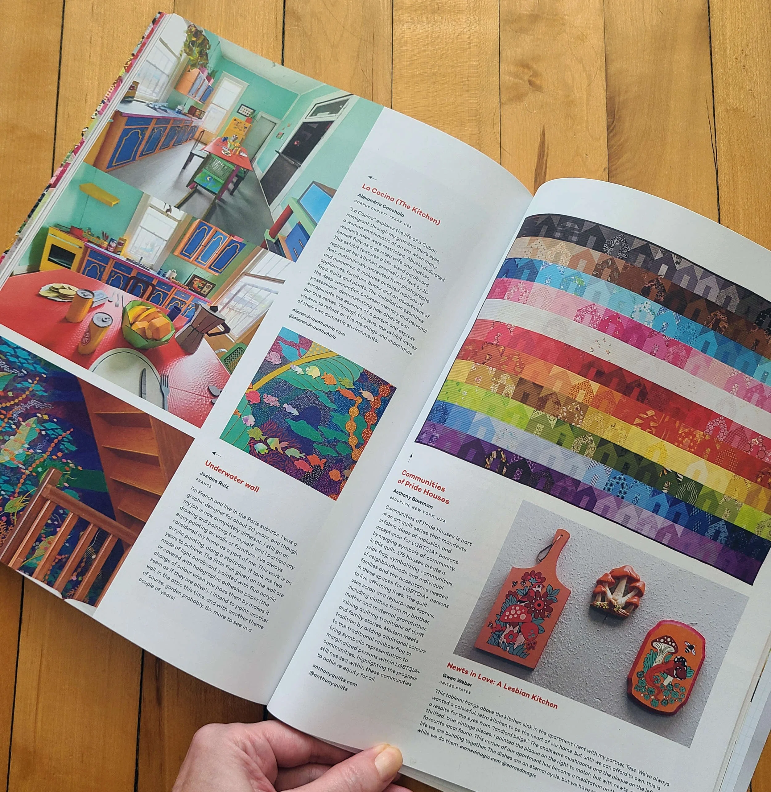 Photo of a magazine open to show a spread with colorful photos of different types of art.