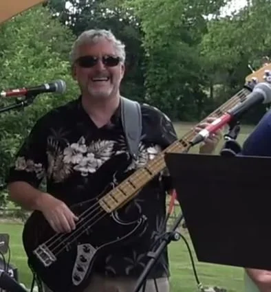 Bassist Craig Ross playing Facebook Friends at a party gig