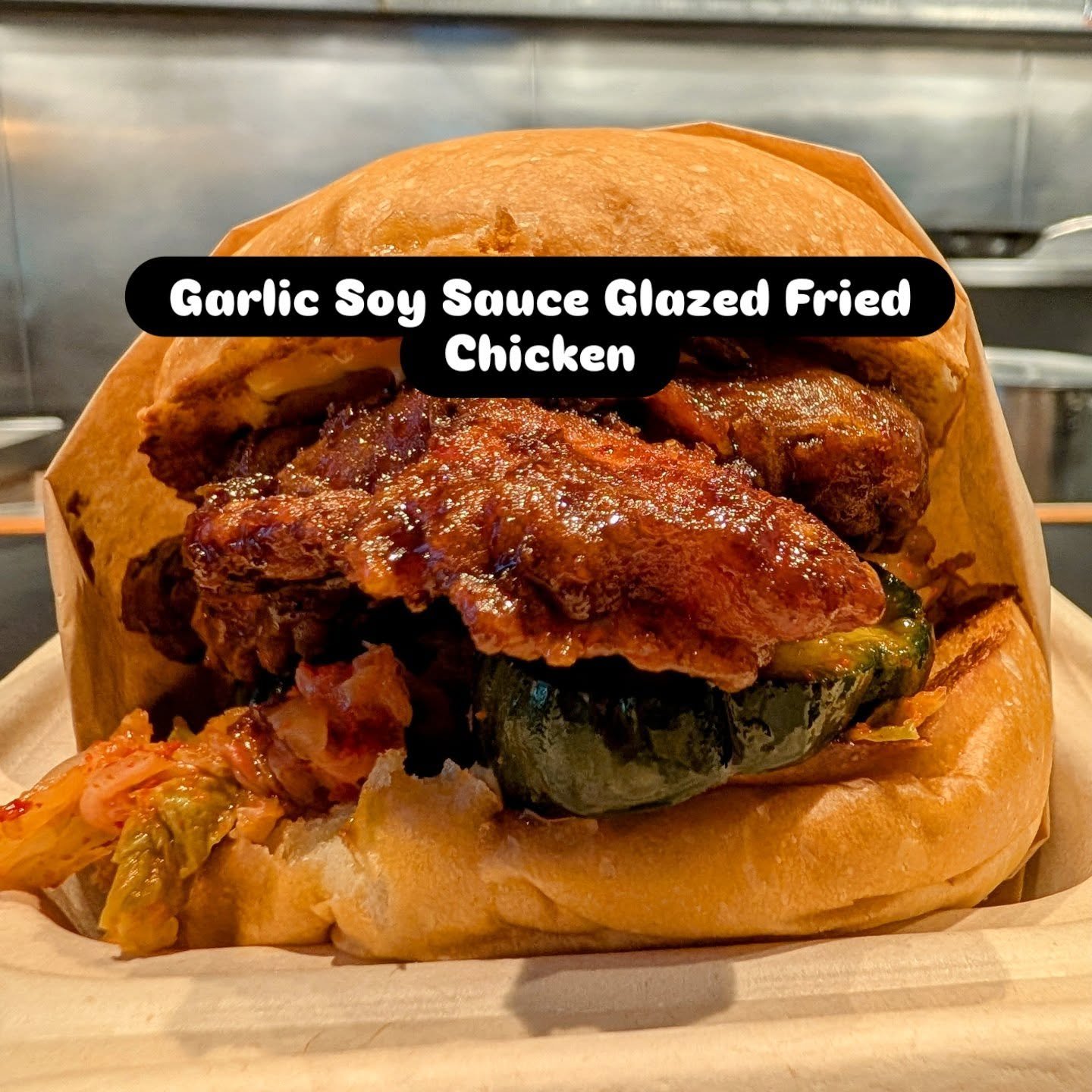 It's cold and raining out! Get this Garlic Soy Sauce Glazed Fried Chicken Sandwich delivered with @doordash #doordash #garlicsoy #friedchicken #koreanflavors #kimchi #koreanpickles #srirachaaioli #semifreddis #challahbun #louschickenshop #lamorinda #
