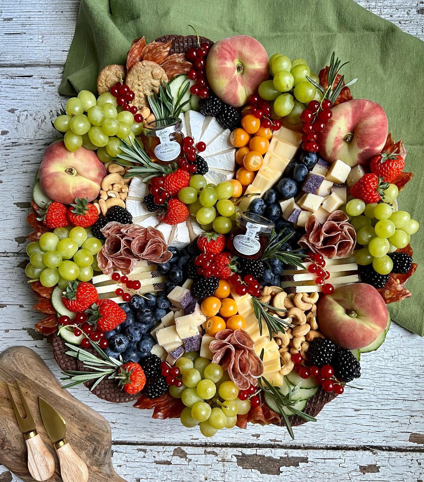 Summer, Summer, Summertime 🌞 is for the freshest of fruit and most luxurious of cheese and charcuterie 🍇 

From Smoked Gouda, to 8 mos. Manchego, to Camembert, to @sartoricheese Merlot BellaVitano, you can expect nothing but the best from this spec